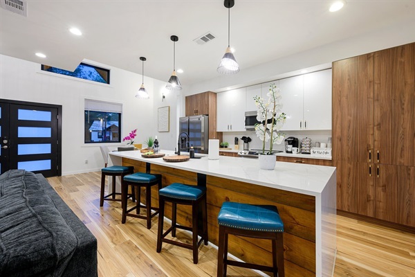 A bright, open kitchen made for gathering, cooking, and lingering conversations.