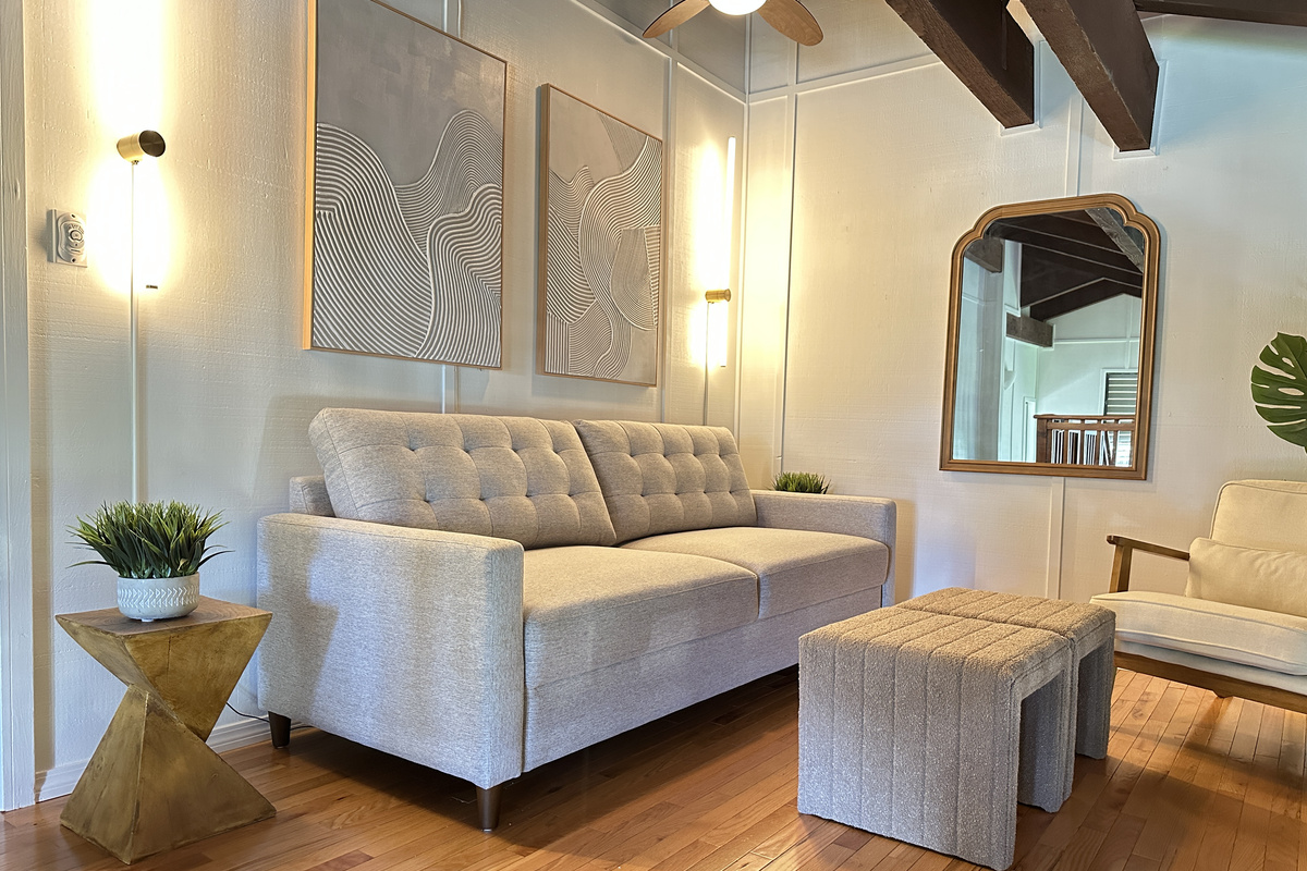Loft area with Queen pull out couch, sitting area, and desk