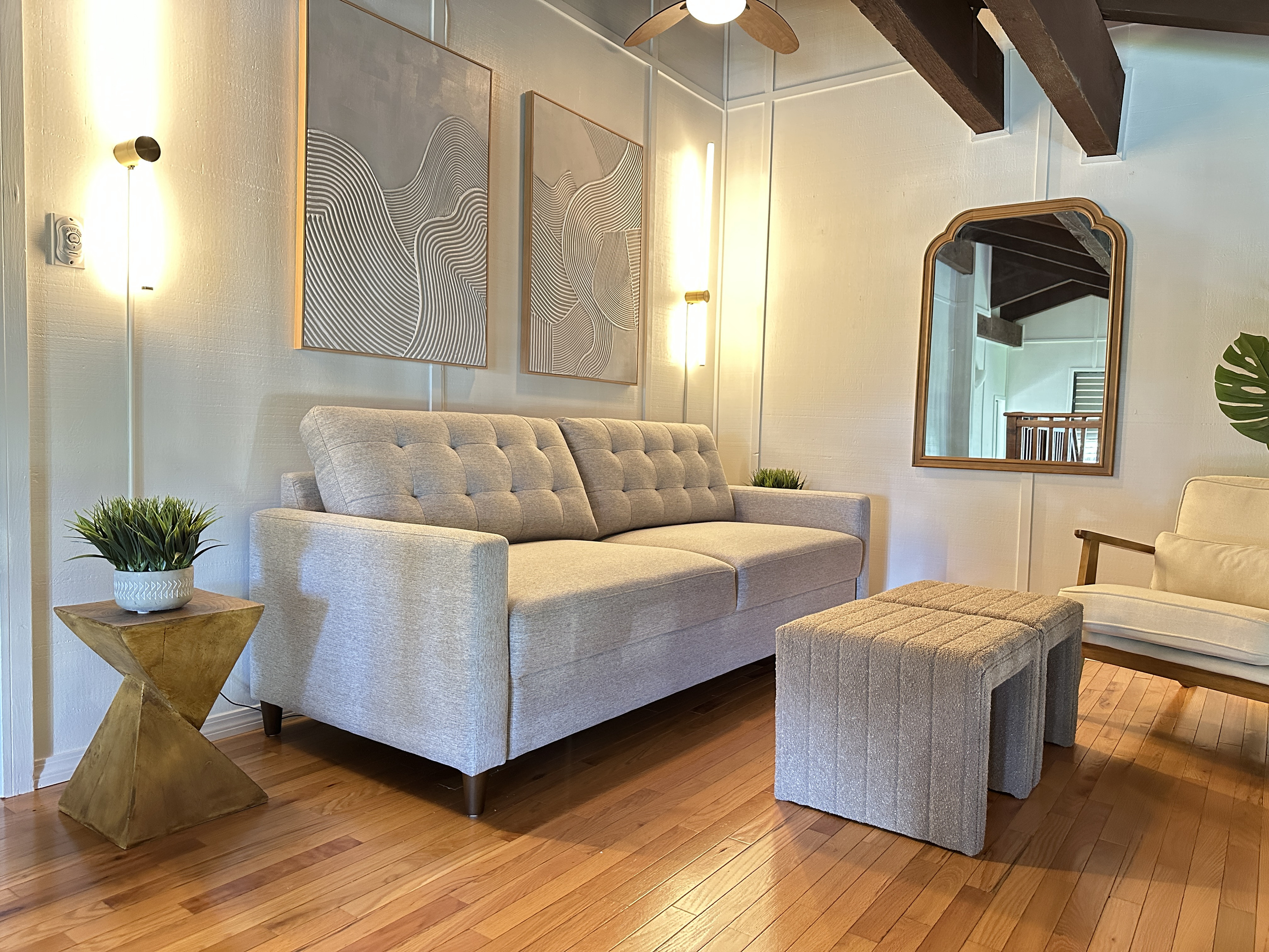 Loft area with Queen pull out couch, sitting area, and desk