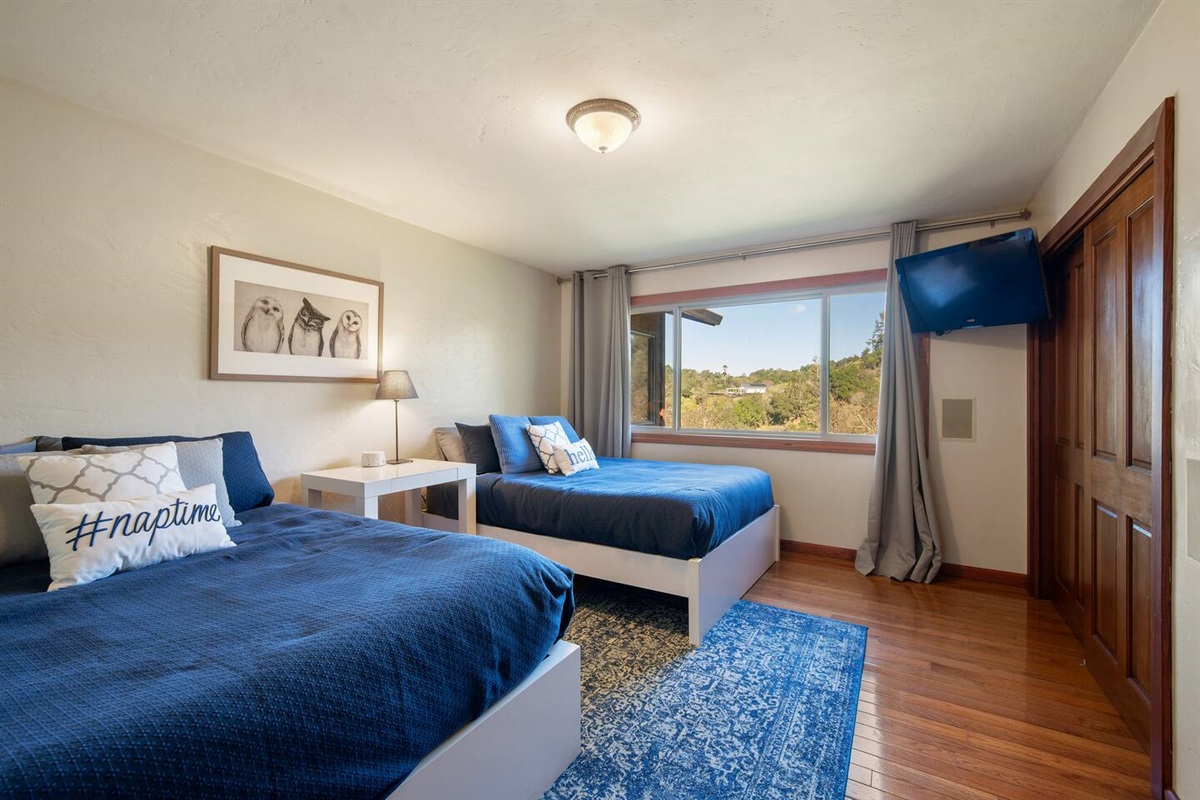 Guest room with two queen beds.