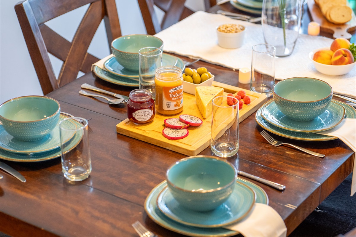 The perfect setting for delicious meals and quality time, this dining space offers charm, warmth, and plenty of seating for the whole group