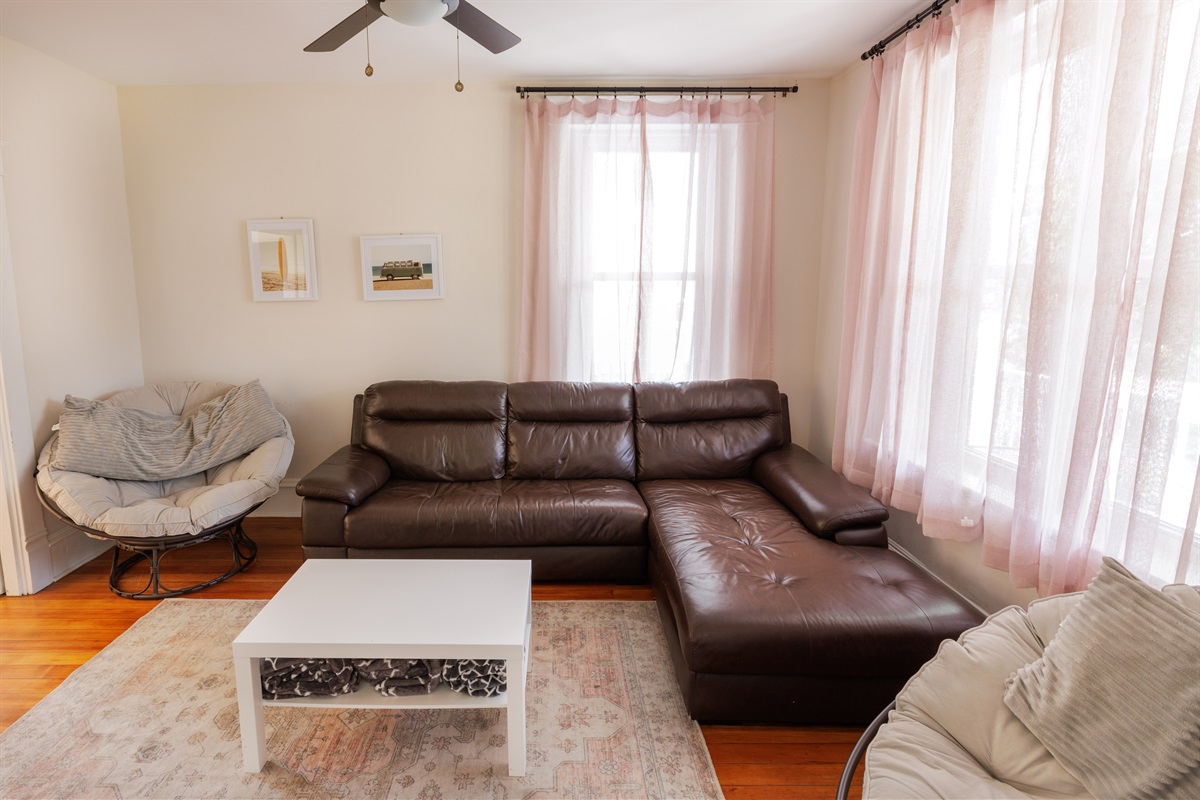 Plenty of lounge seating in the living.