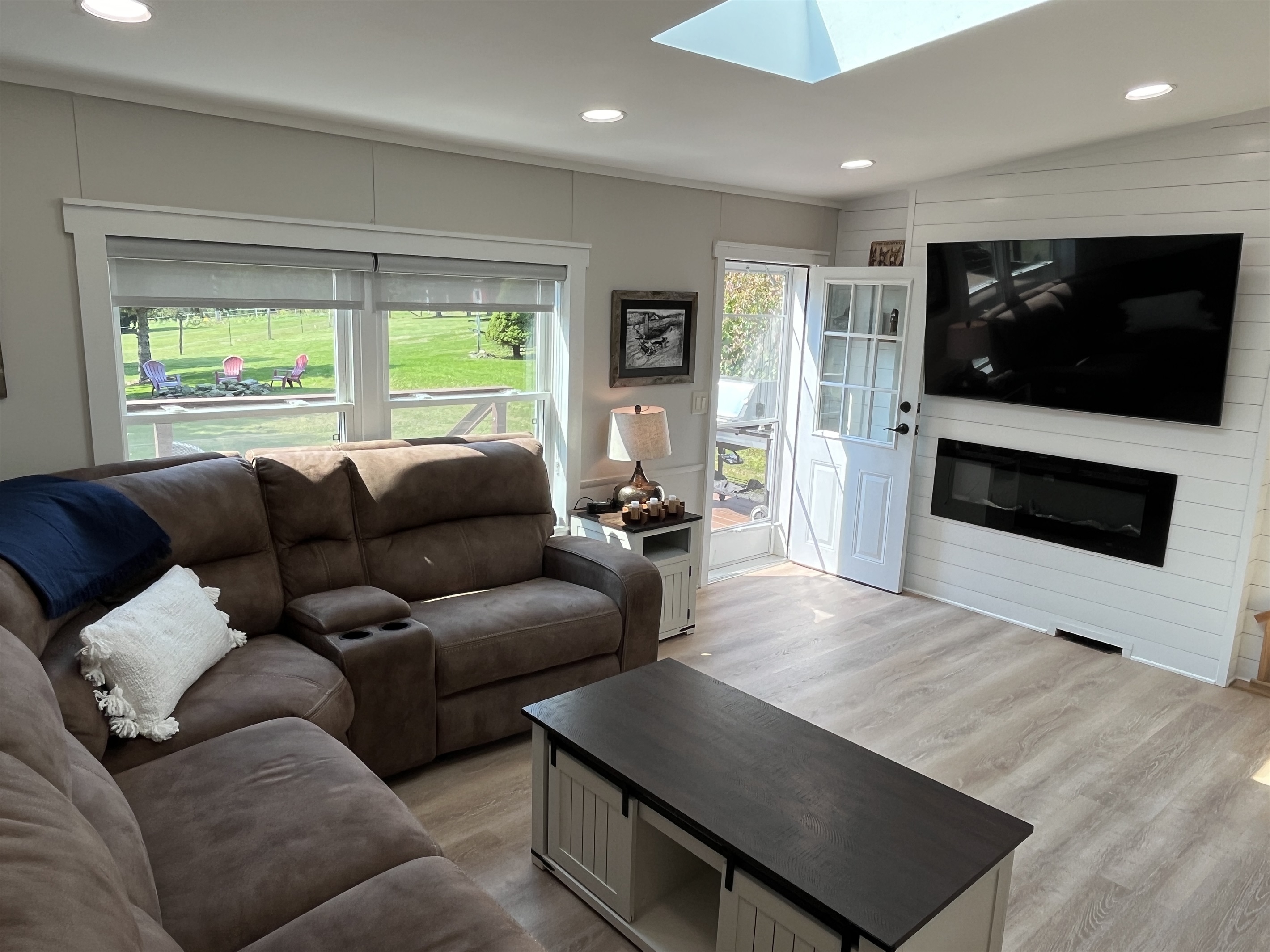 Living area with sectional and SmartTV