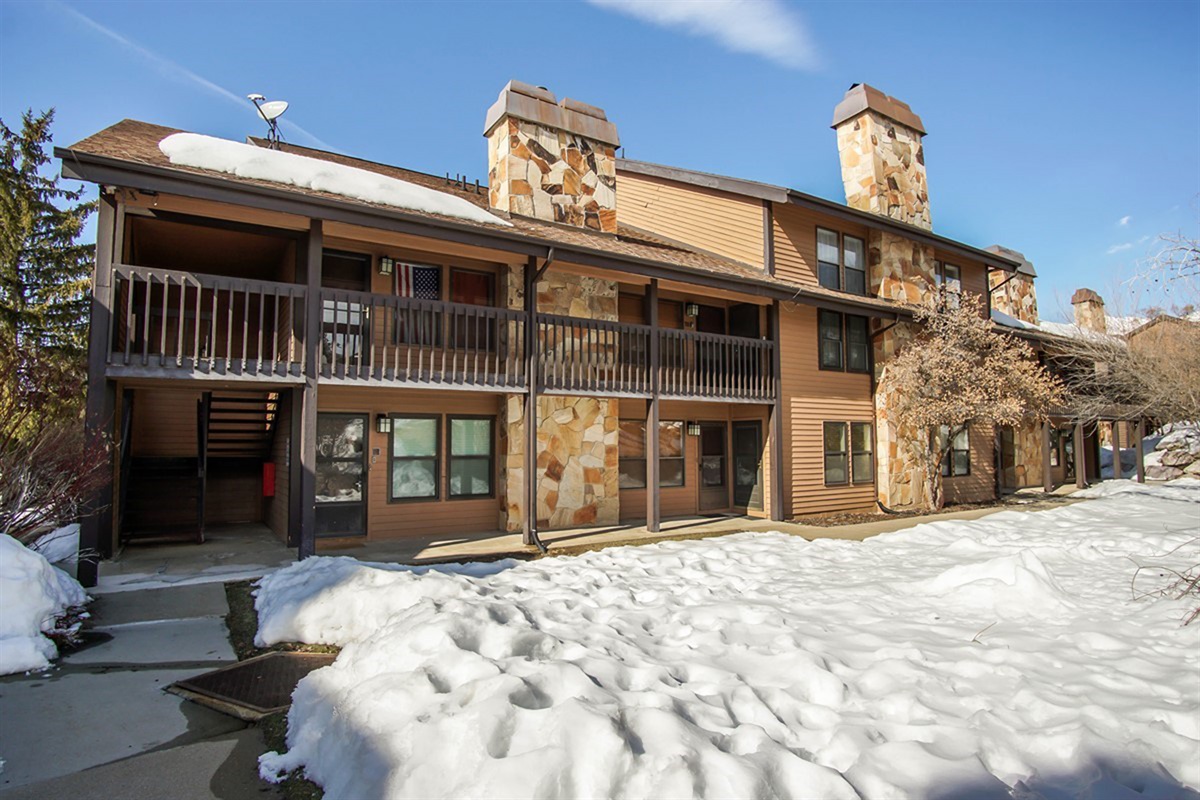 Charming alpine-style property building with easy access to all community amenities.