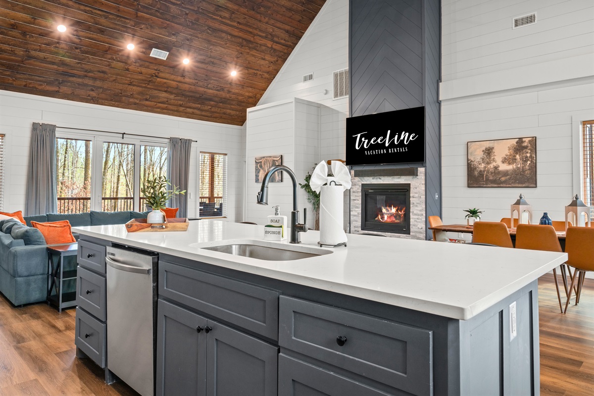 Bright counters and clean finishes give this kitchen a fresh, open feel that makes everyday cooking feel simple and enjoyable.