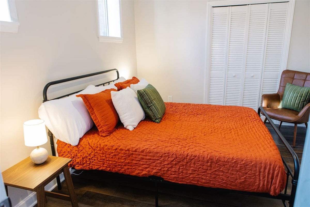 secondary room with a Queen bed