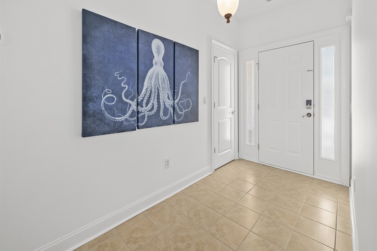 Simple, clean, and welcoming entryway sets the tone the moment you arrive — open, uncluttered, and designed for an easy transition from travel mode to vacation relaxation.