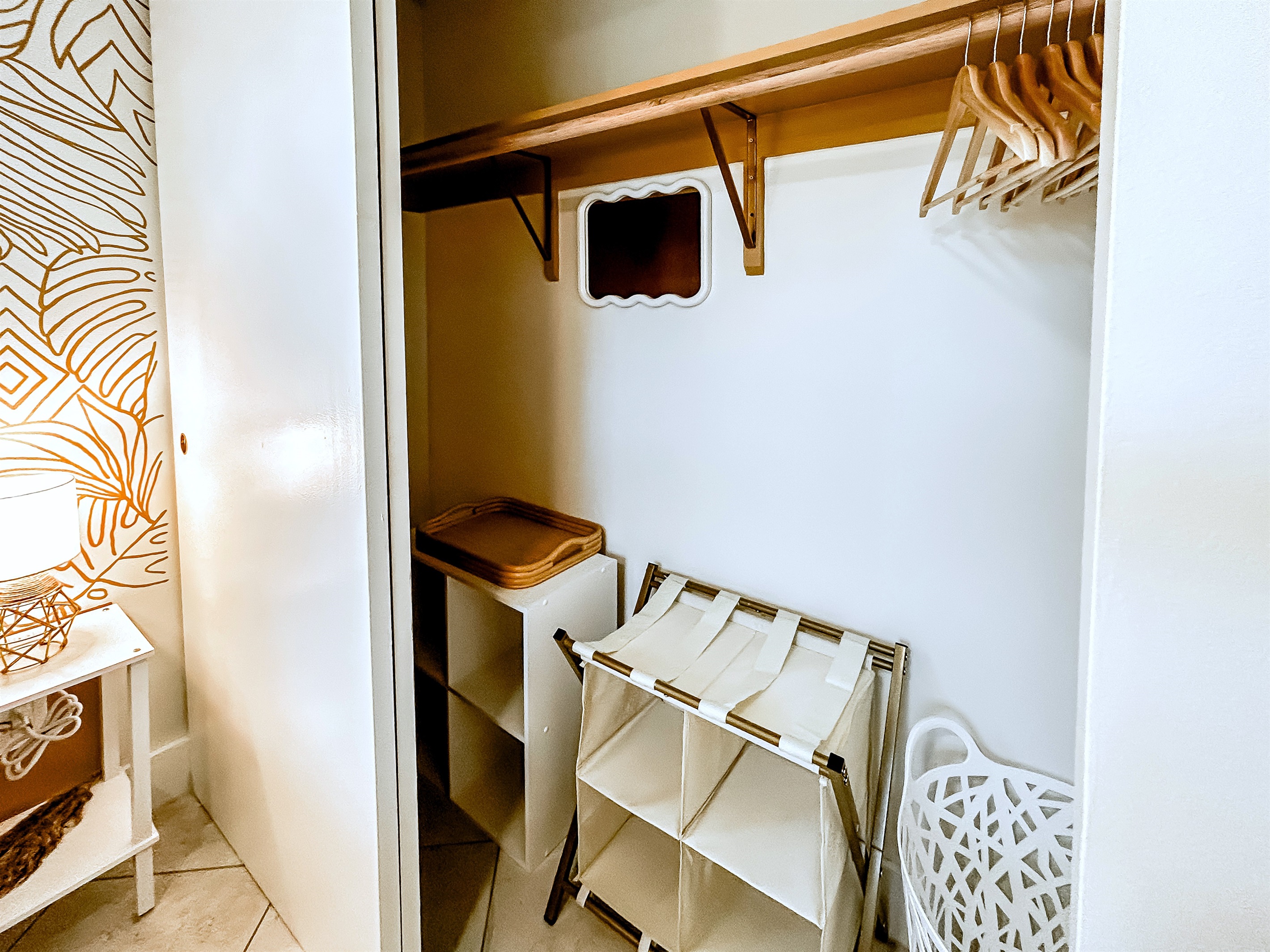 Queen Bedroom with Queen Size Bed, Nightstands with Charging Ports 4 Pillows, Local Artist Mural, Luggage Rack, Laundry Basket & White Noise Fan