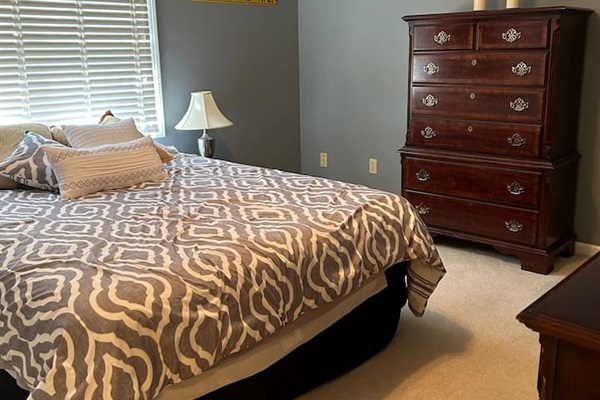 Bedroom #3. New Queen sized bed with mattress topper.