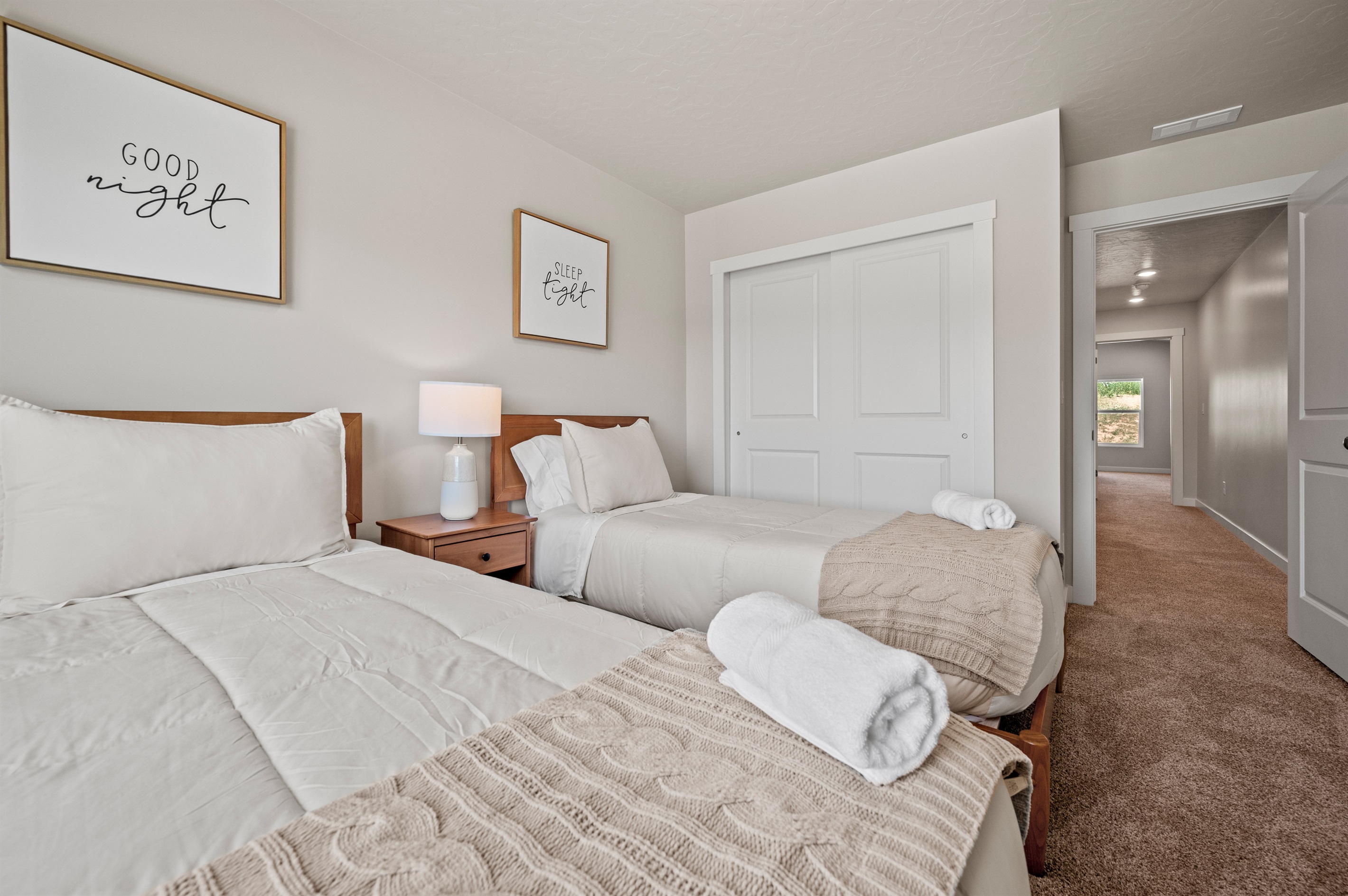 The twin bedPerfect for kids or extra guests, this bedroom features two comfortable twin beds and a spacious double closet for easy storage.