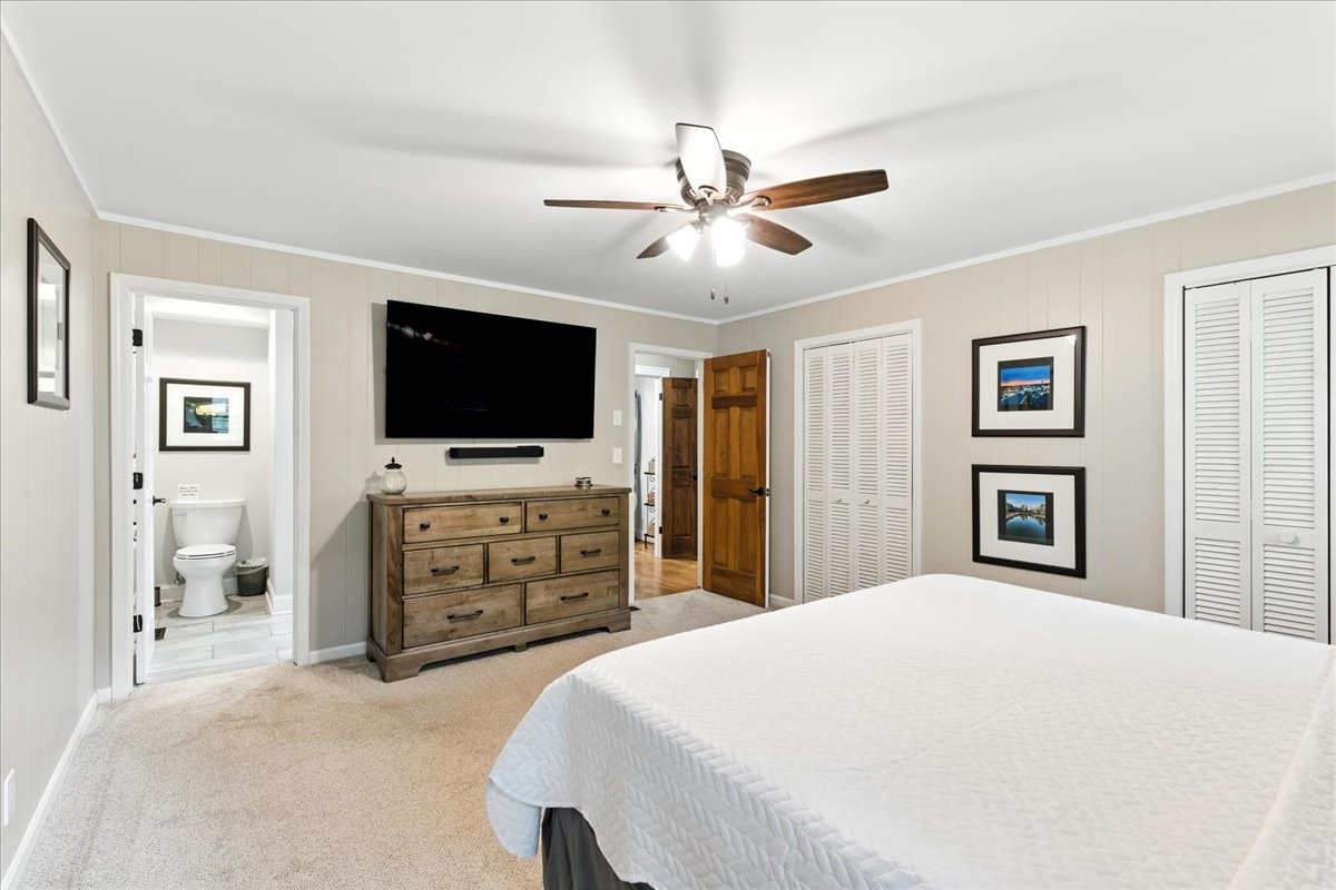 The king suite is equipped with spacious drawers, a large closet, and a private bathroom for added convenience.