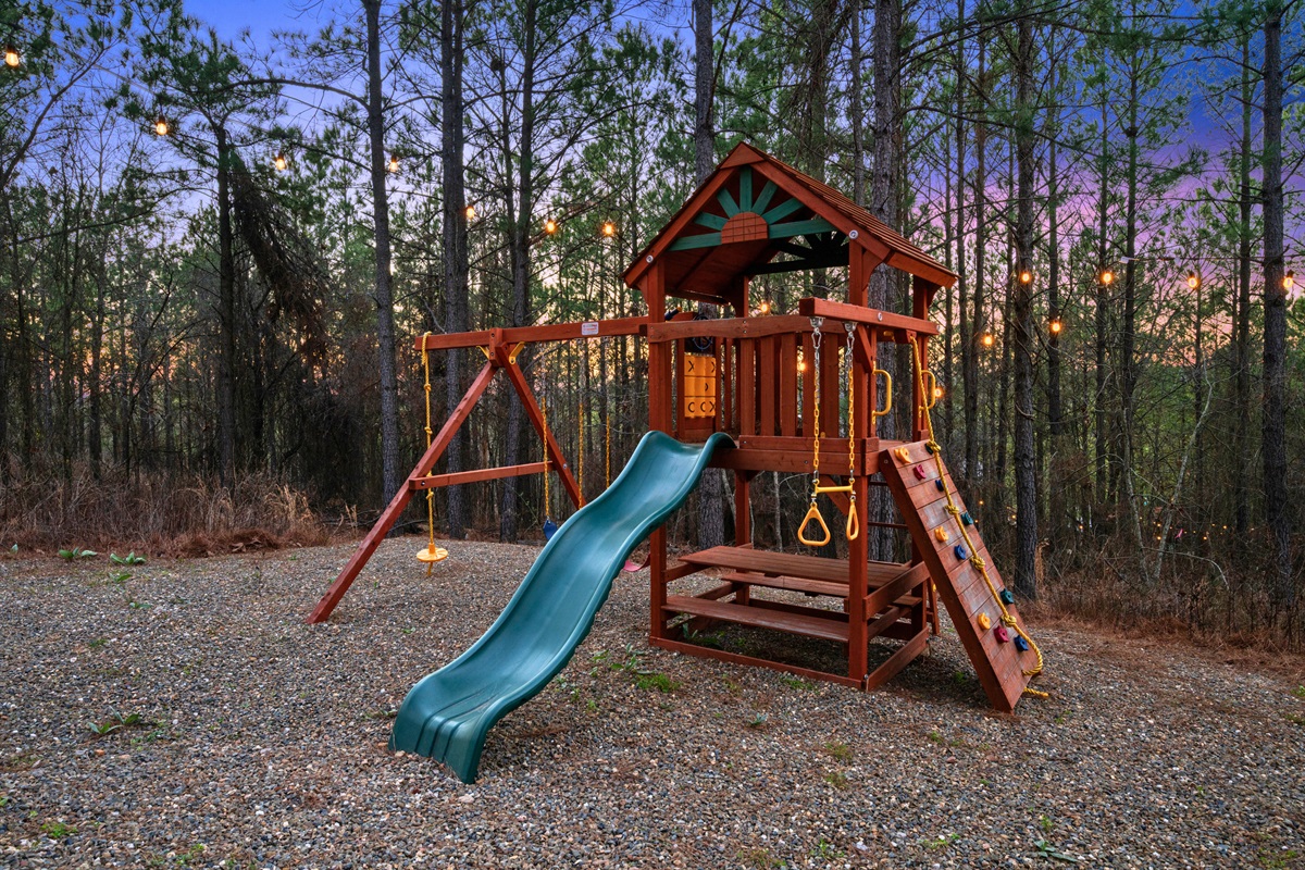 The kids’ playset is such a fun bonus, giving little ones a place to climb, slide, and burn off energy while the adults relax nearby.