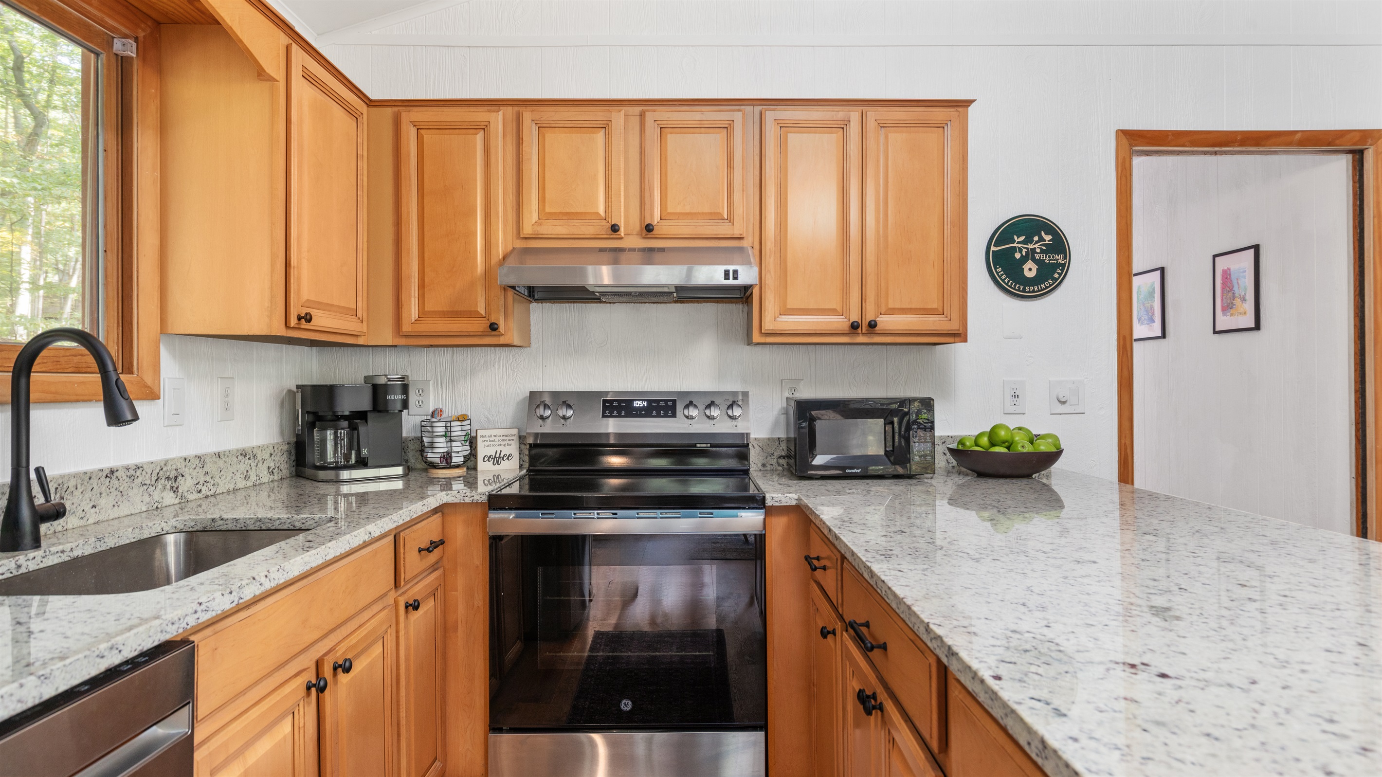 Fully stocked kitchen with everything you need—pots, pans, silverware, coffee, teas, creamers, kids’ dinnerware, blender, and more!
