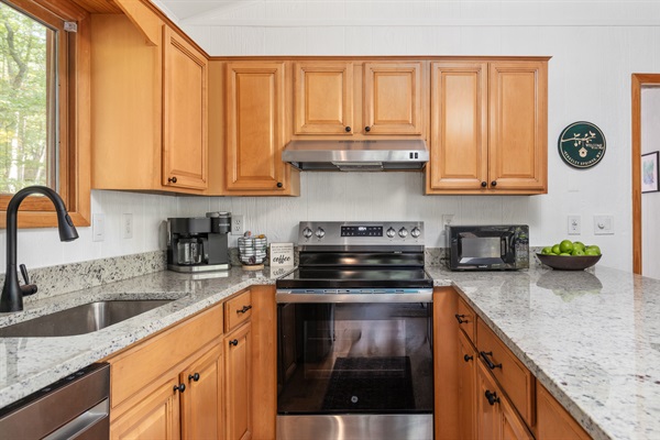 Fully stocked kitchen with everything you need—pots, pans, silverware, coffee, teas, creamers, kids’ dinnerware, blender, and more!