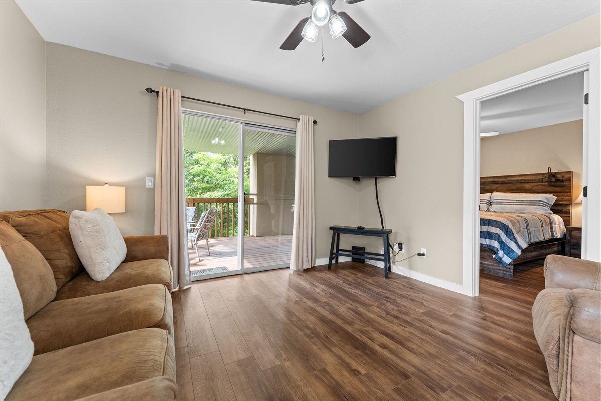 Relax in a comfortable living space where you can unwind, stream your favorites, and step outside to enjoy the peaceful balcony.