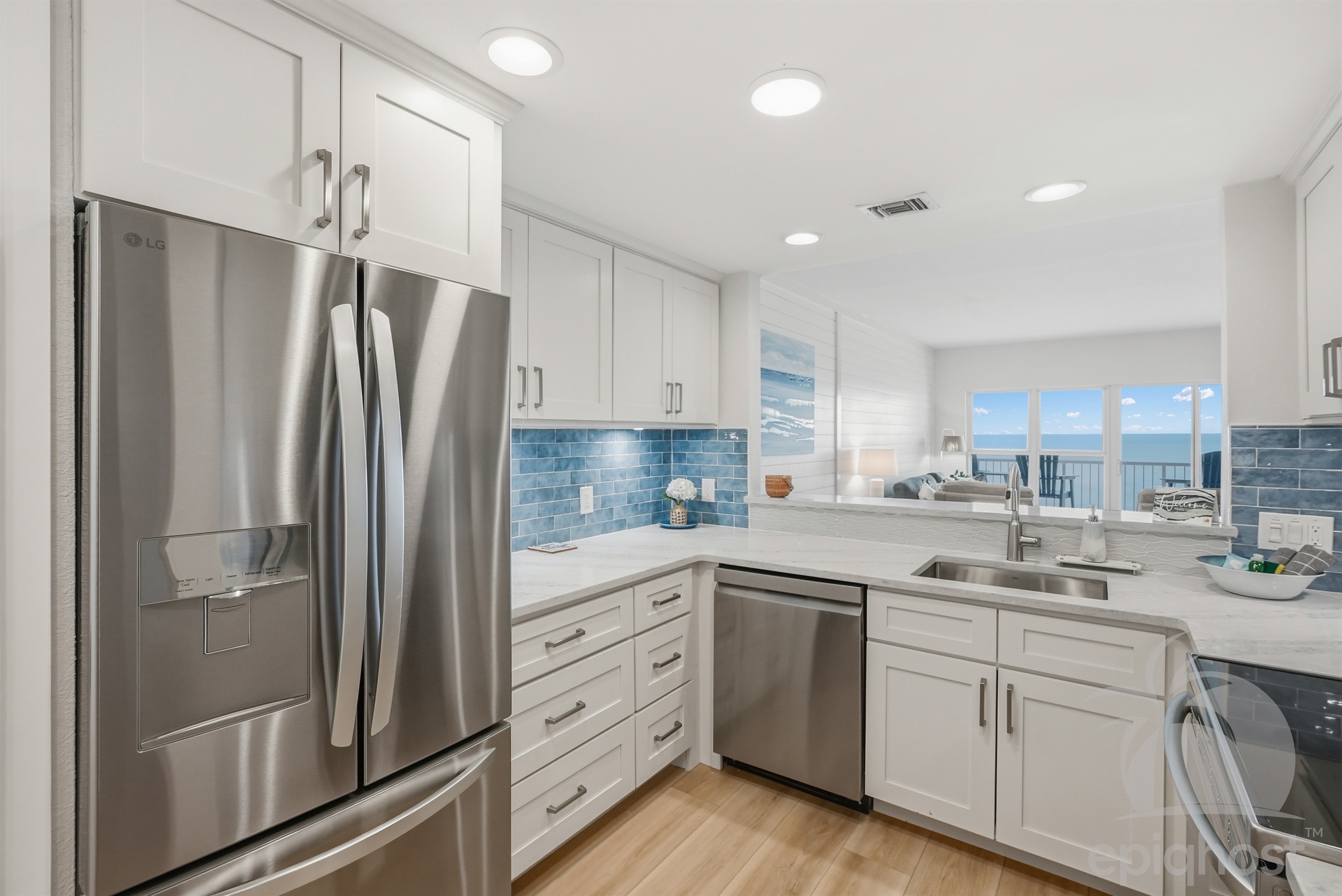 Open kitchen with stainless appliances