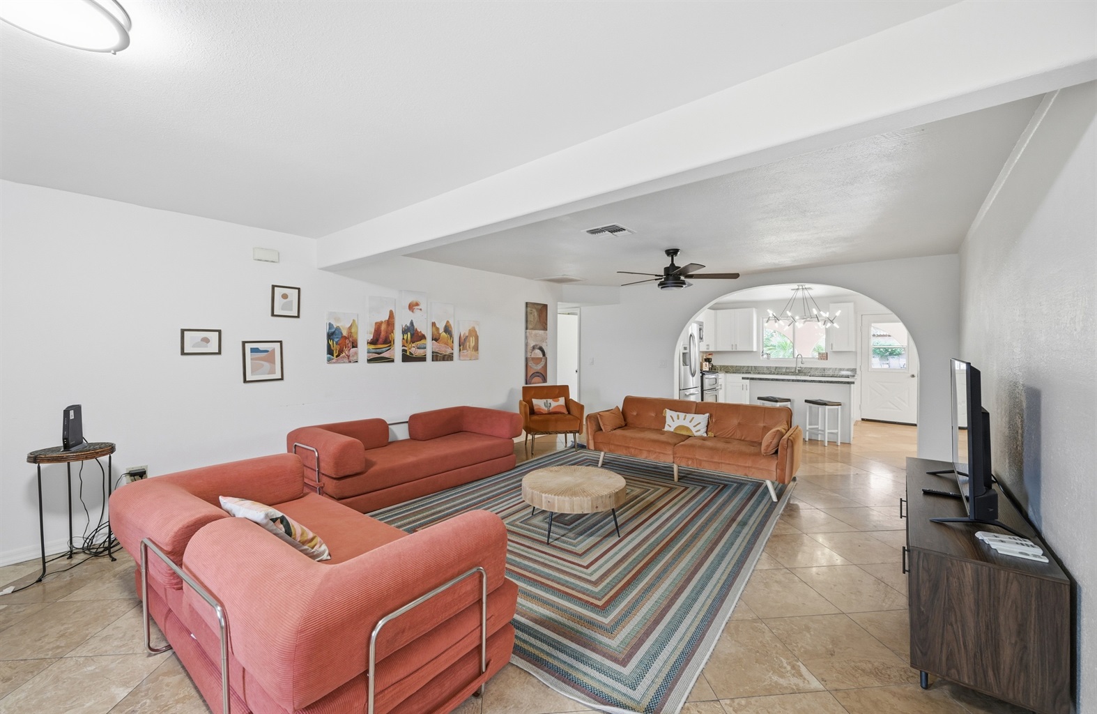 Gather in the cozy living room, where stories flow and movie nights stretch into late laughs 🧡✨