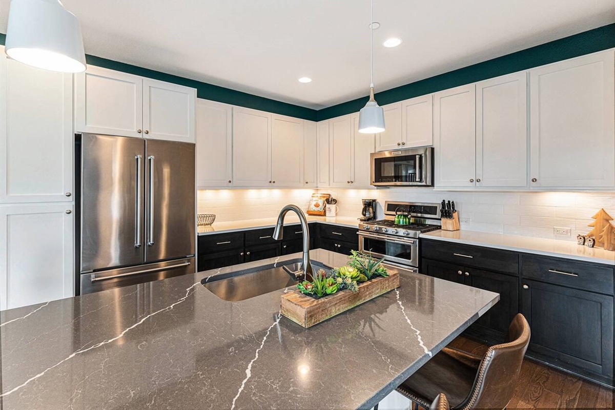 The large, luxury kitchen is outfitted with 2 ovens, a microwave, and all the equipment and accessories needed for the gourmet cook looking to entertain!