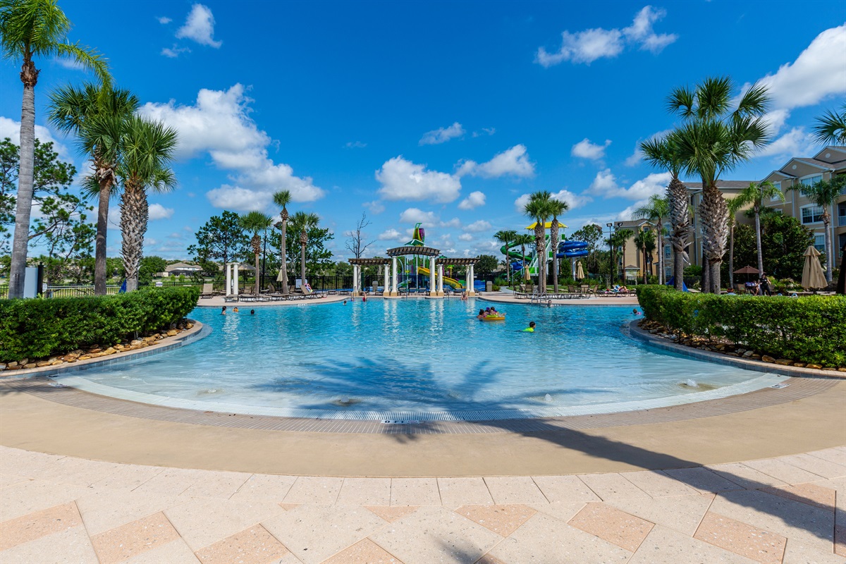 Welcome to vacation! The community zero-entry lagoon style pool will melt away all your cares.