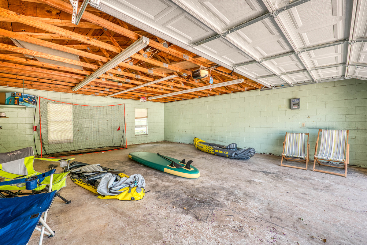 2 inflatable canoes and a paddle board