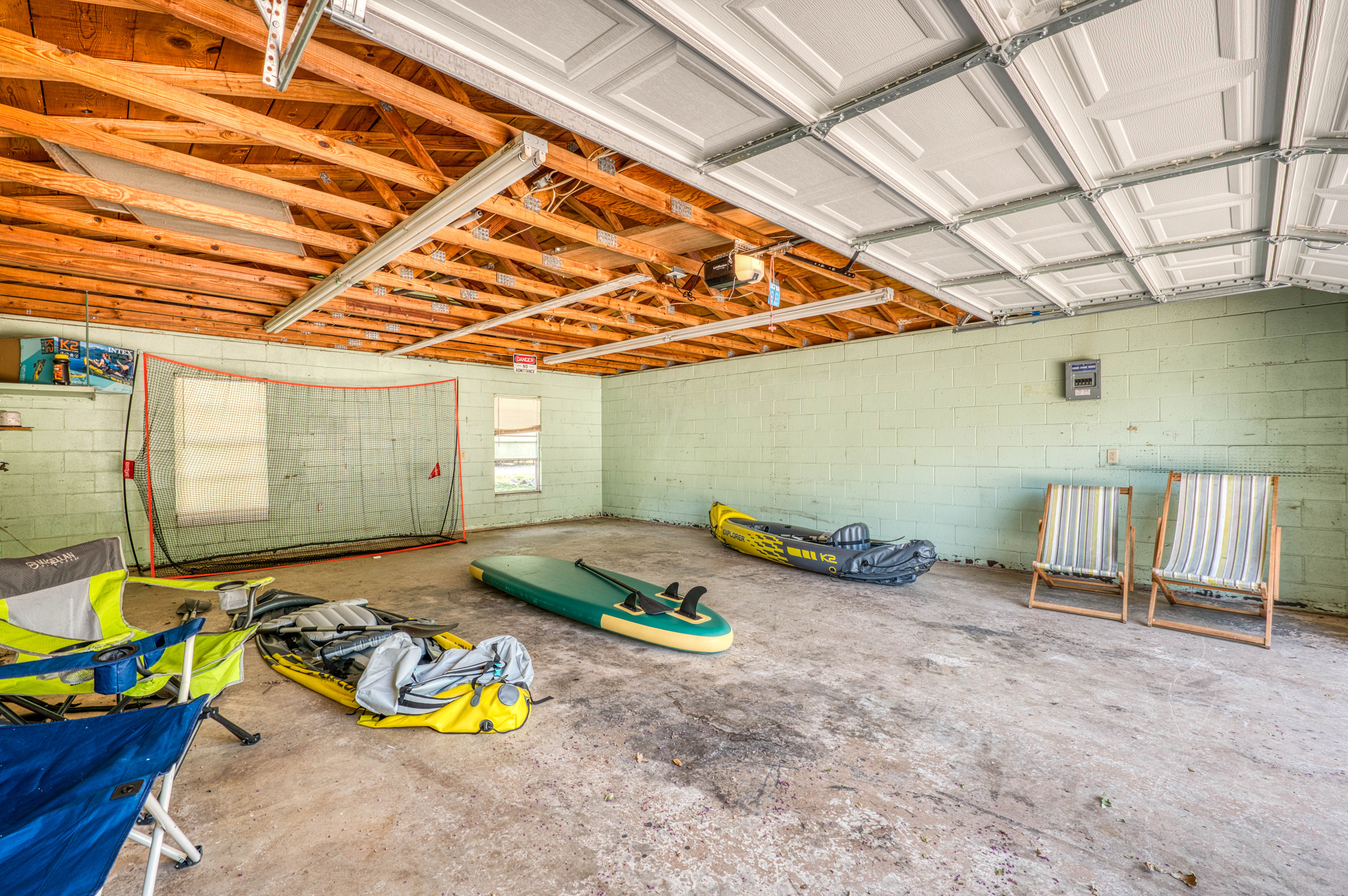 2 inflatable canoes and a paddle board