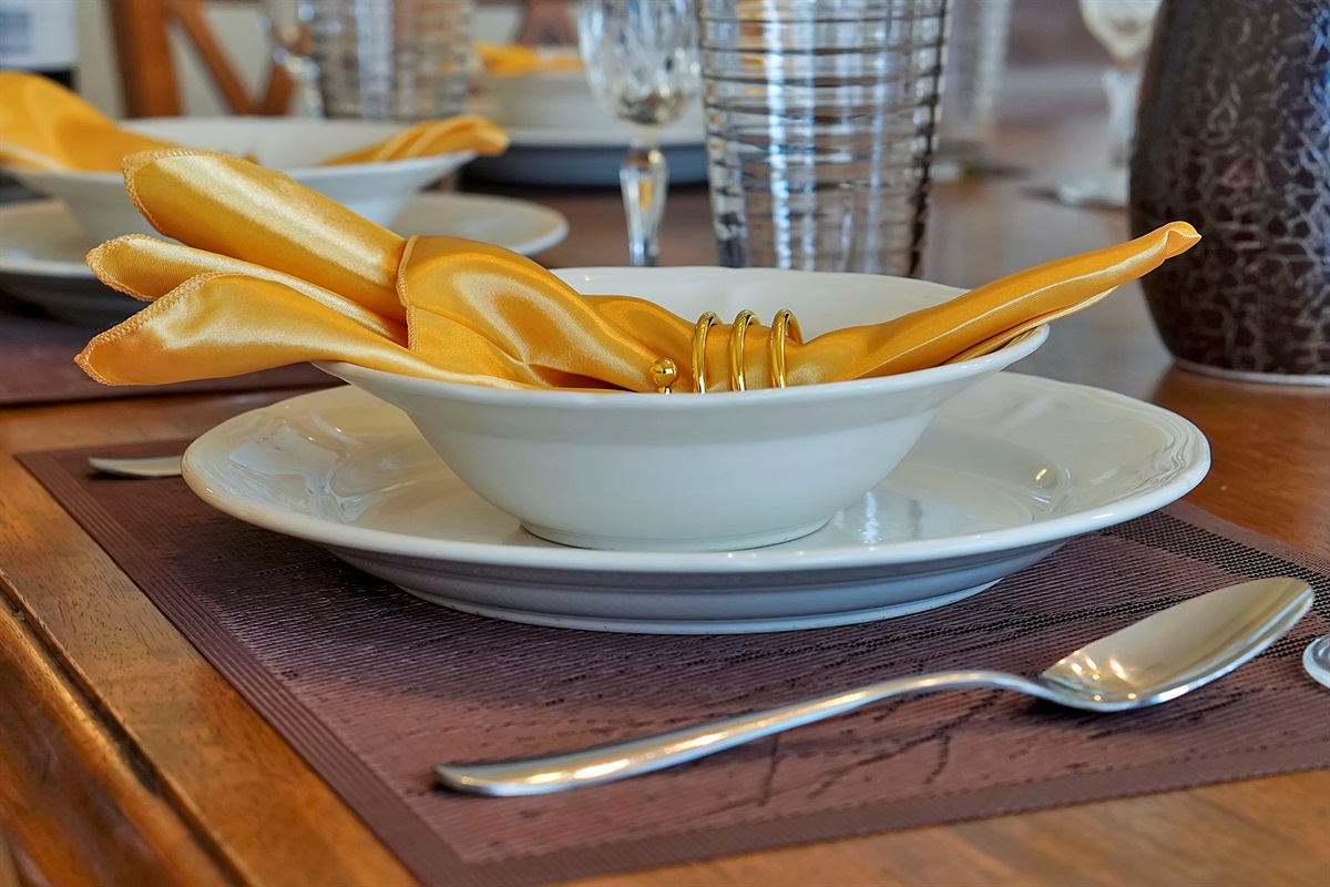 Enjoy a complete dining experience with plenty of dishes, glassware, and silverware for everyone at the table