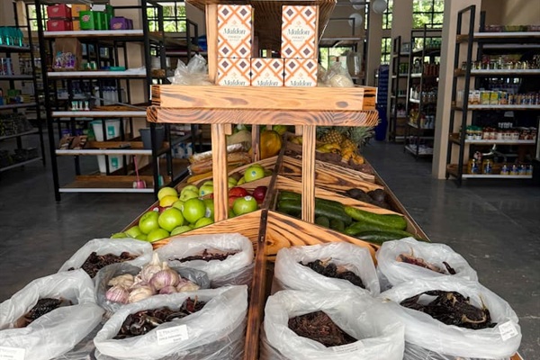 Fresh fruit and vegetables stand and most items you need for a comfortable stay. 