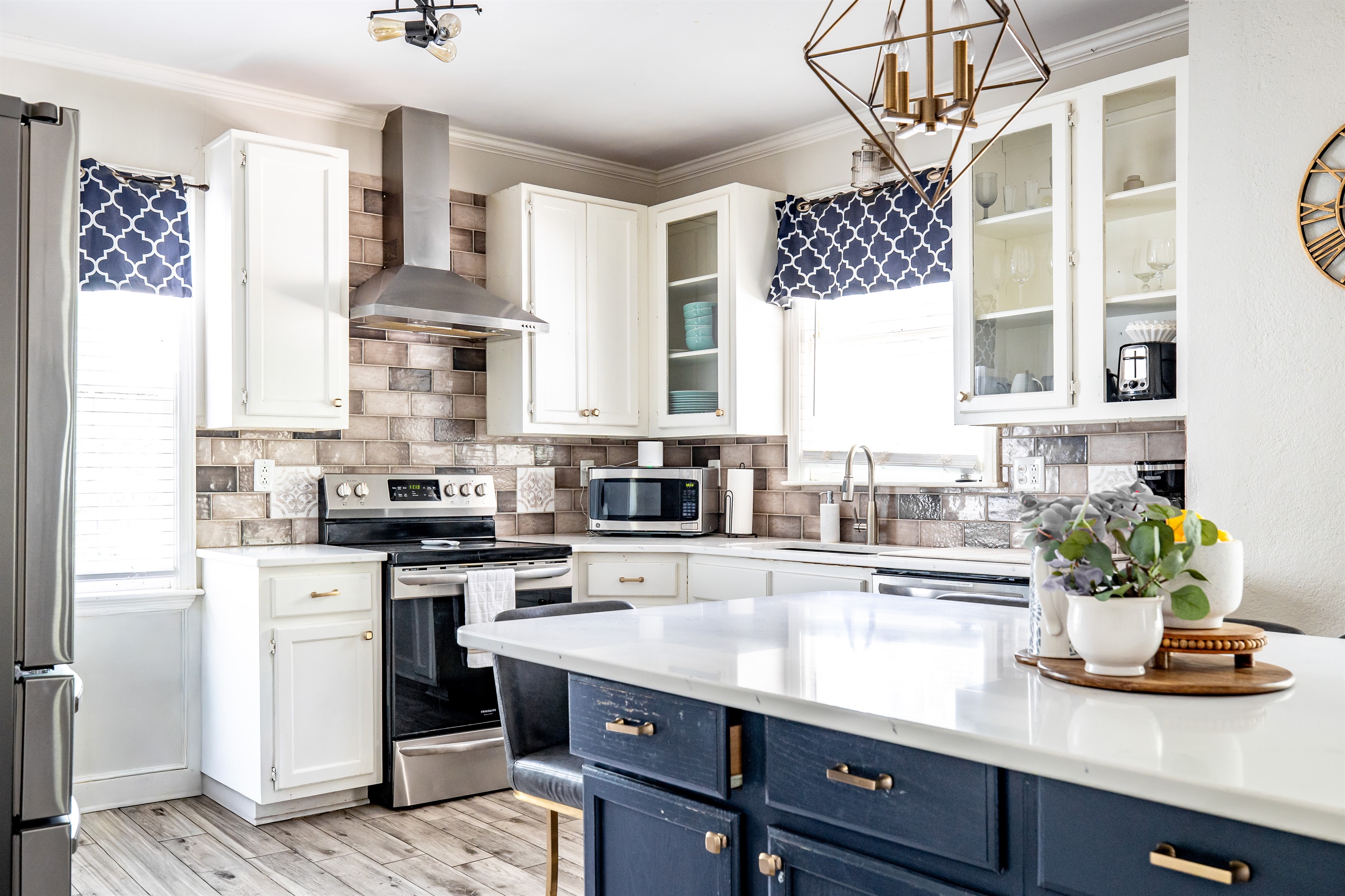Kitchen with island and barstools