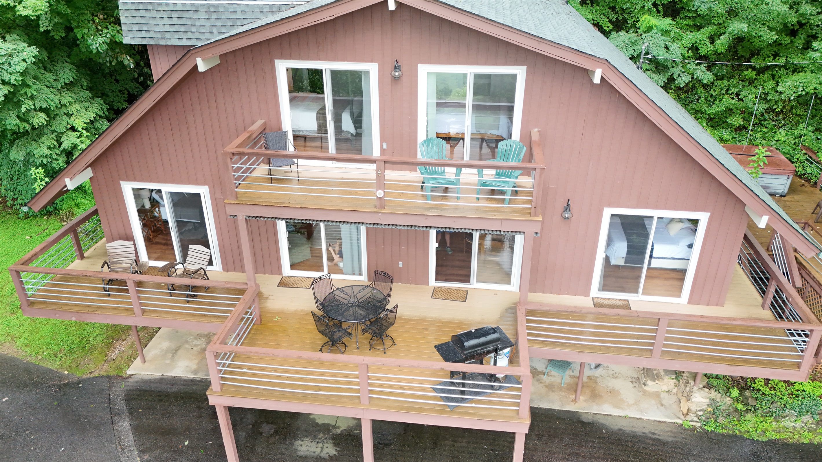 Deck Paradise: Enjoy al fresco dining and stunning views on spacious, inviting decks!