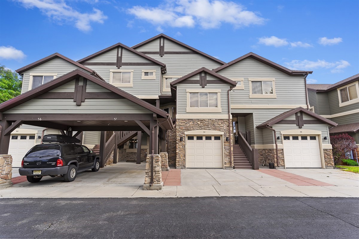 Exterior of the townhome with garage access.