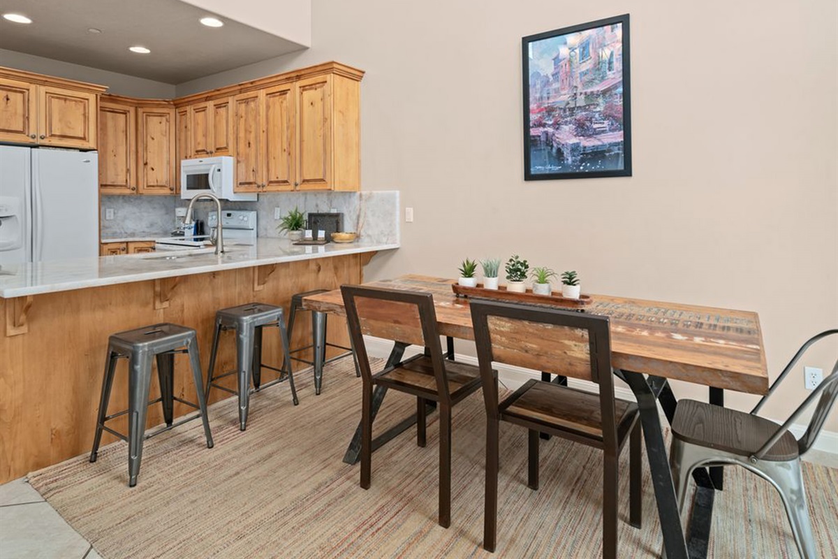 Dining space with bar seating—great for casual meals and conversation.
