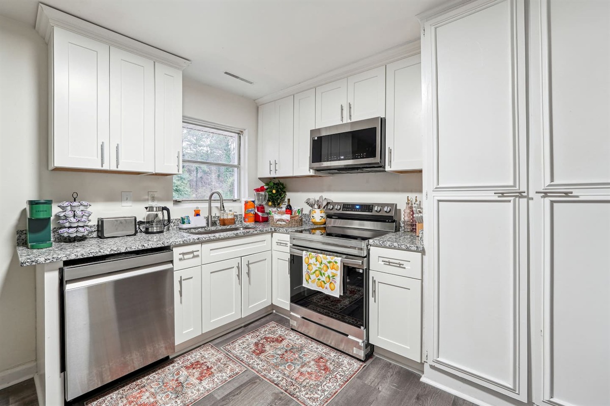 Enjoy a fully equipped kitchen featuring a dishwasher, oven, stove,fridge, microwave, sink, toaster, and coffee maker. It also comes stocked with glasses, cooking utensils, pots, pans, spoons, forks,... 