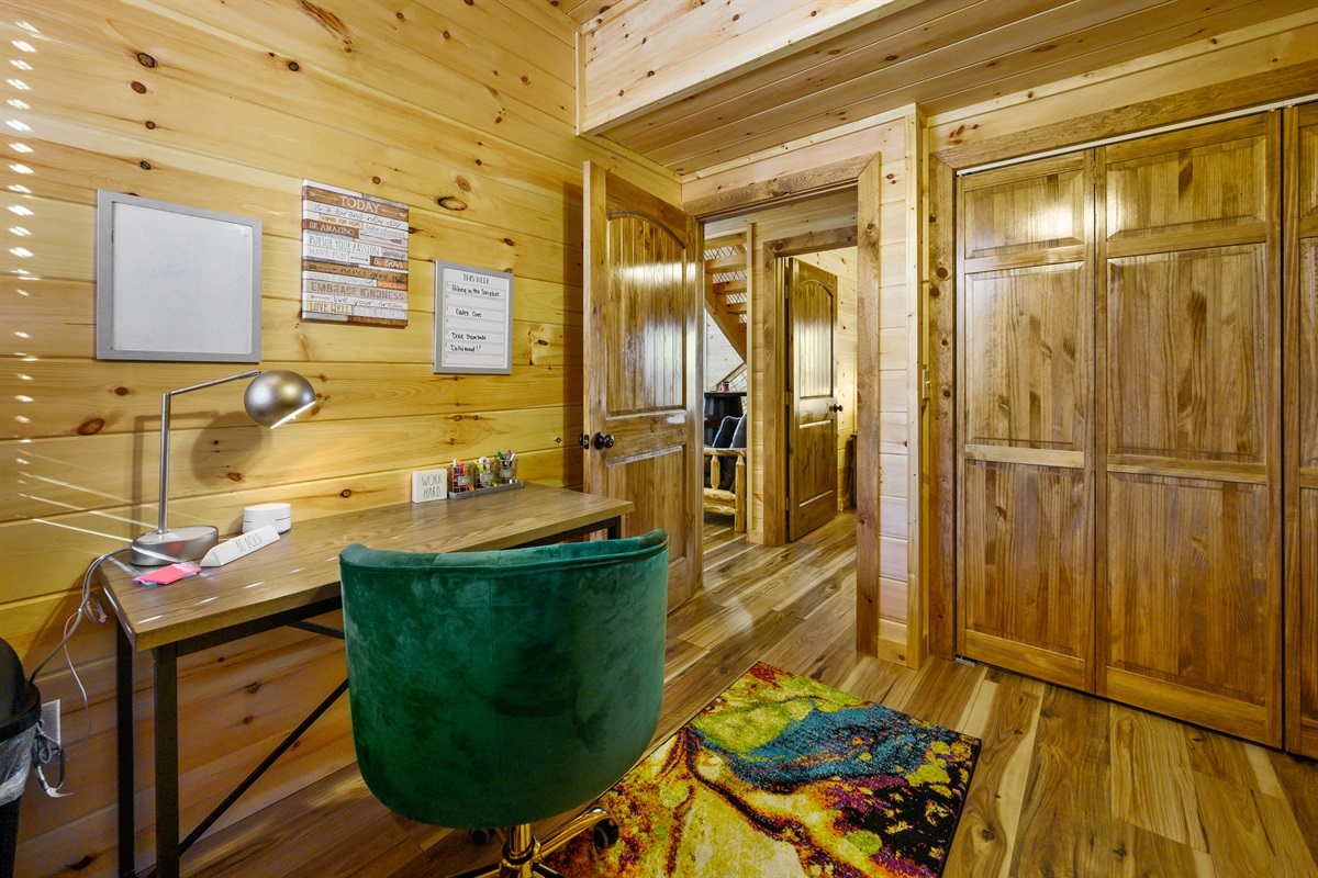 Cypress Downstairs office in laundry room with washer and dryer behind the closed doors to the right