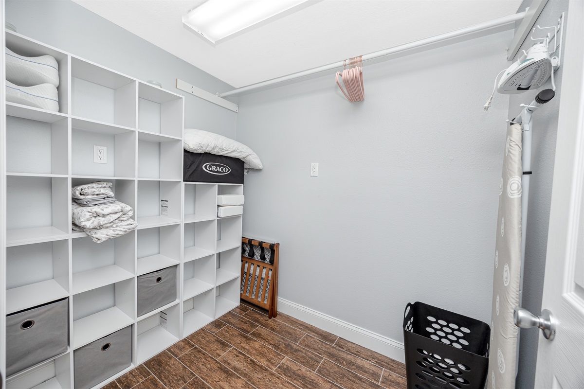 Giant walk-in closet in master bedroom