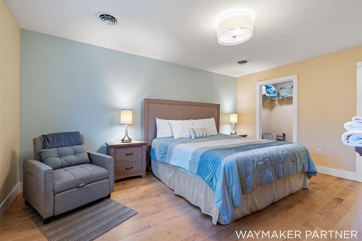 Private master suite (Bedroom #3) at the top of stairs on 2nd floor with King bed and a pull out couch