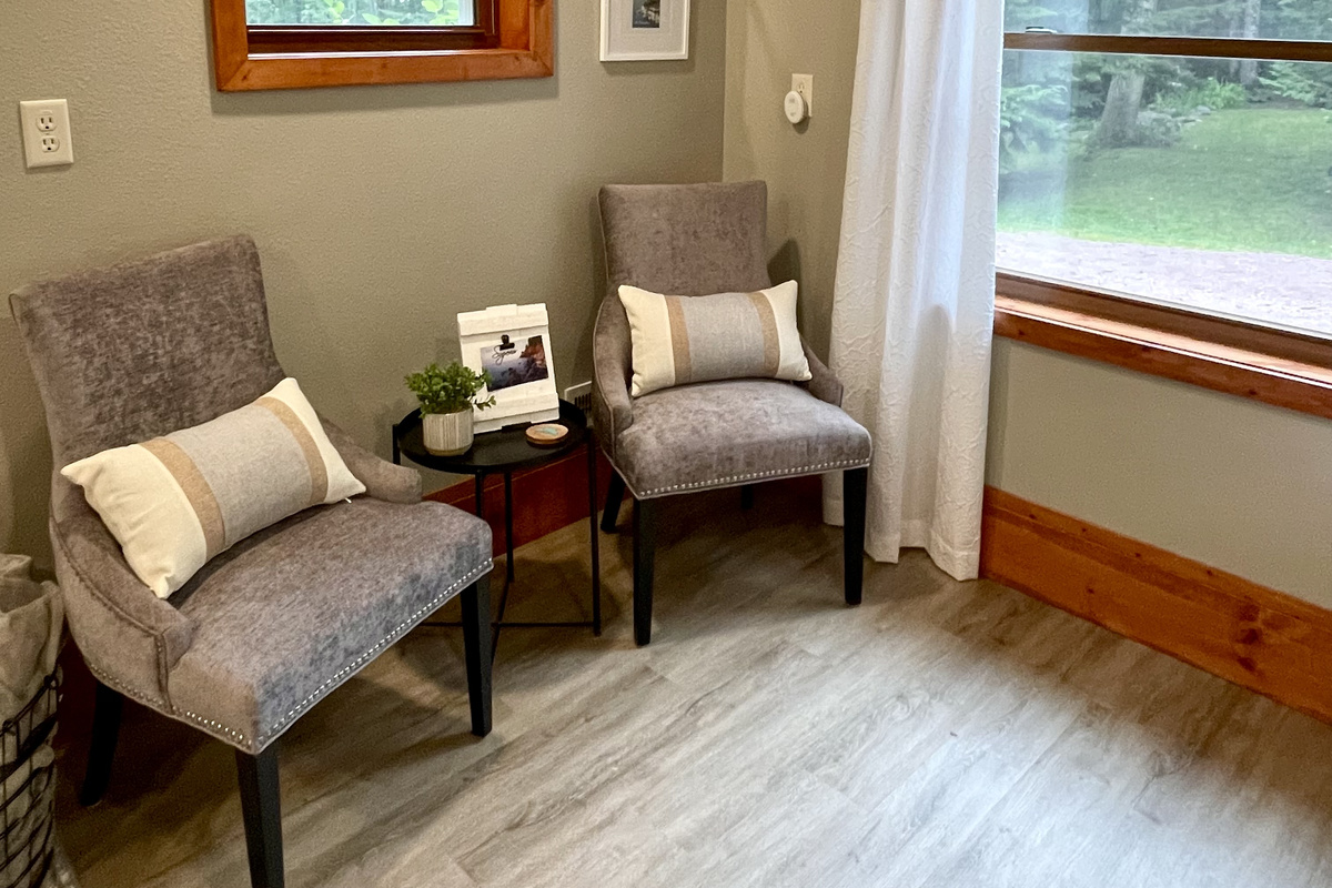 Rock Garden Bedroom seating area next to the large window