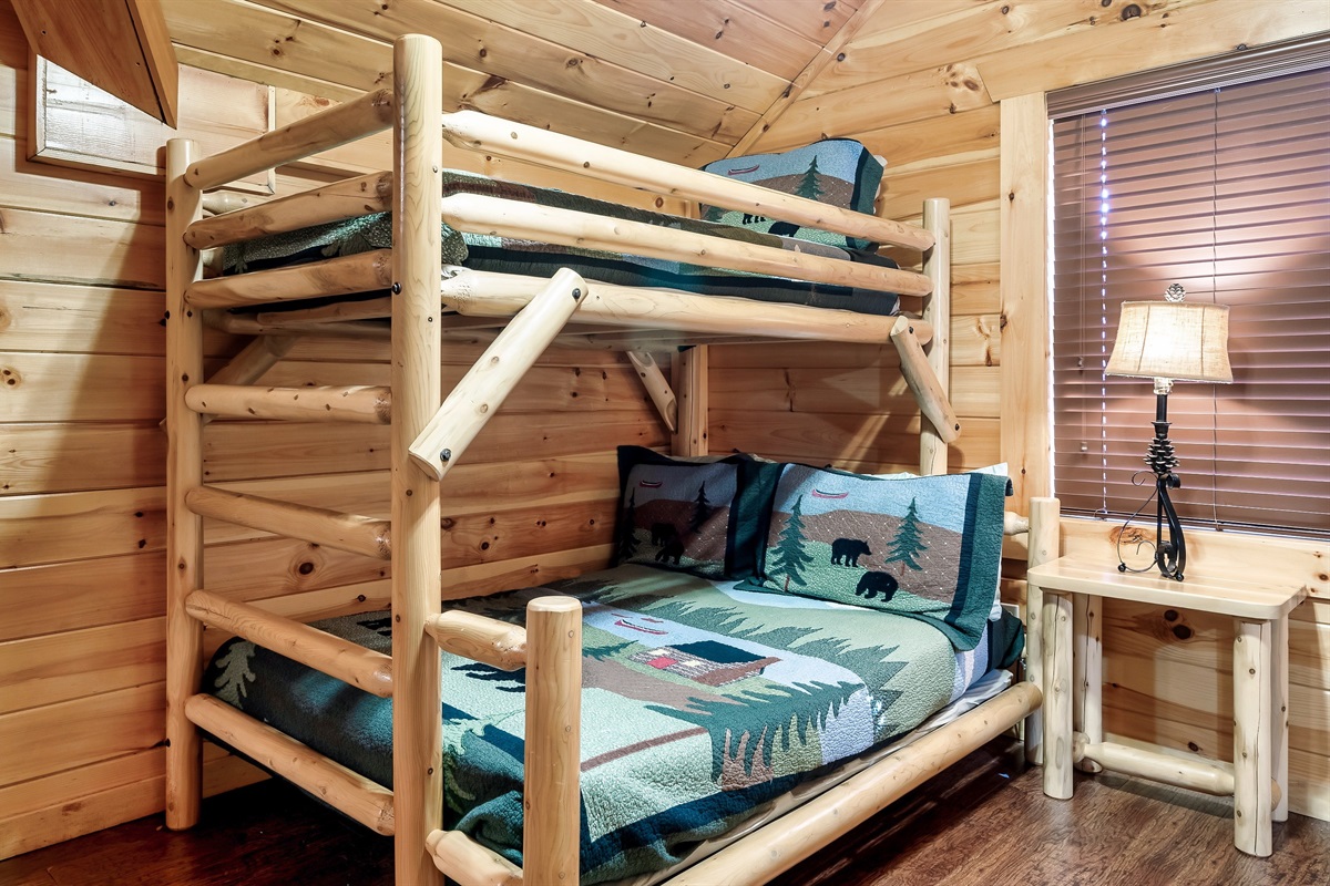 Spark adventure in a whimsical woodland themed bunk room that instantly becomes a kid favorite.