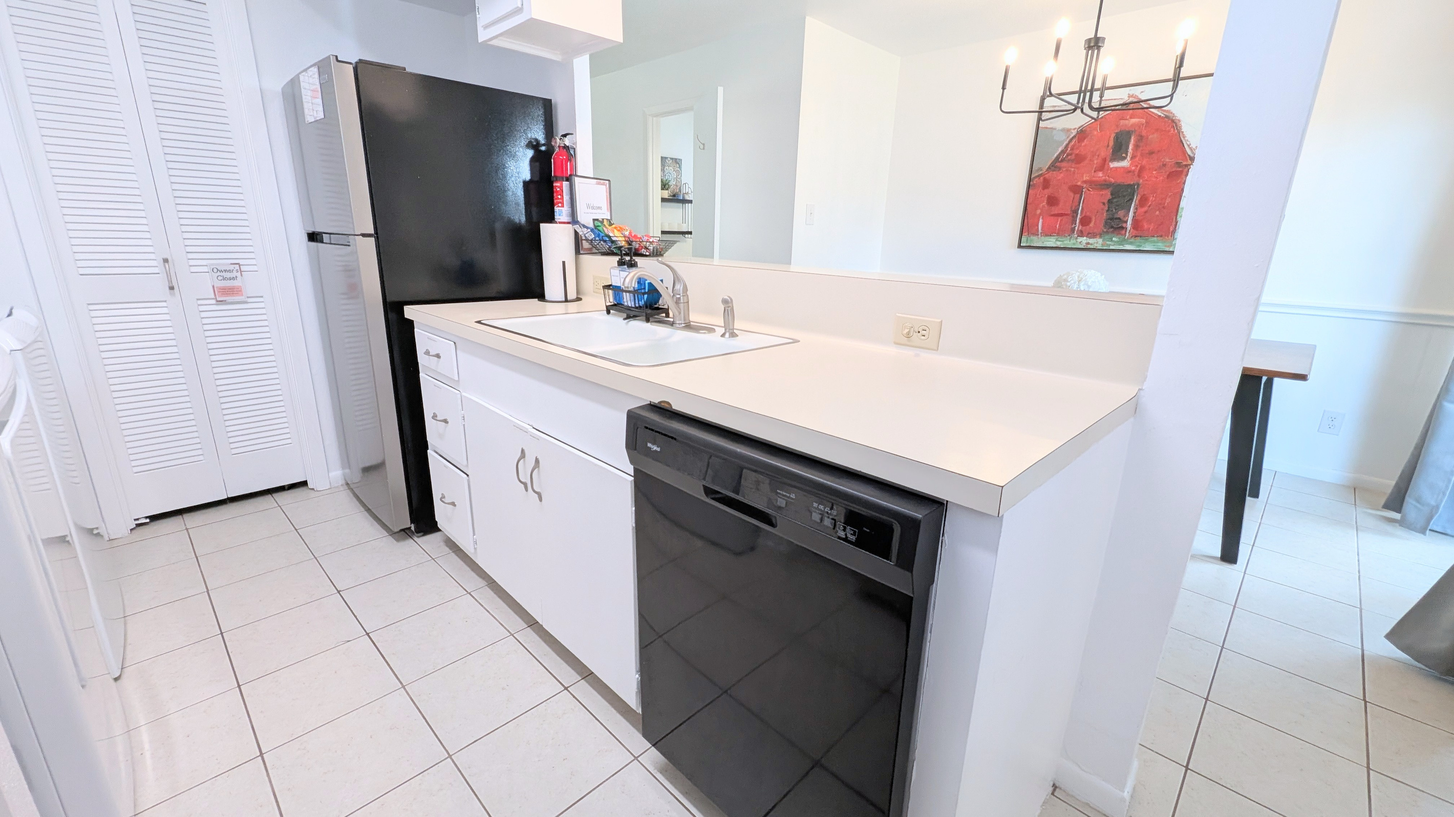 The kitchen includes a dishwasher, with detergent provided for your convenience.
