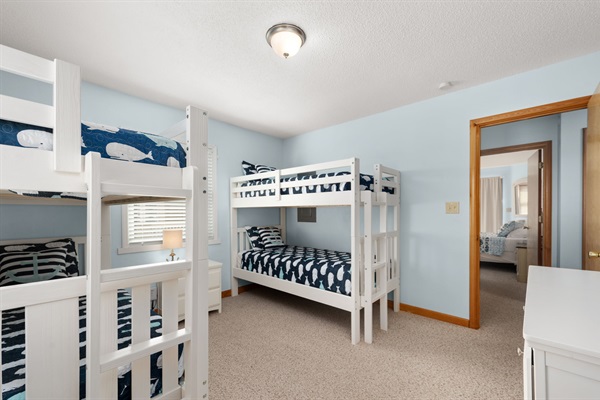 Bunk room with 4 single beds