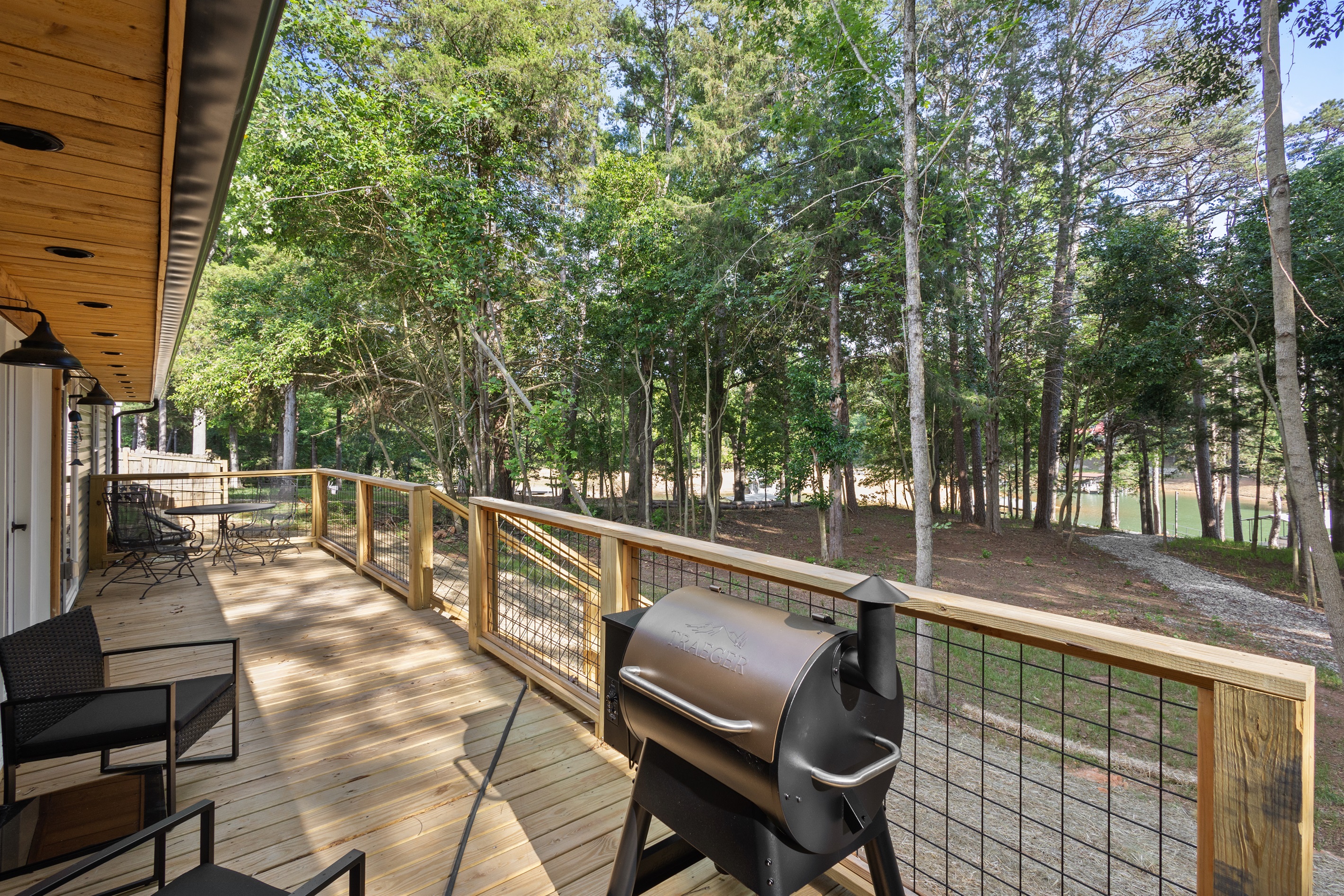 Lakeside porch with grill and hot tub