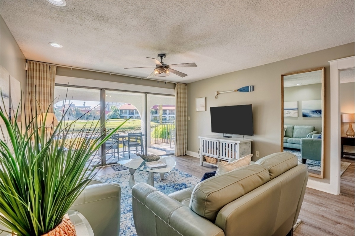 Comfy seating with a smart TV and access to the oversized patio