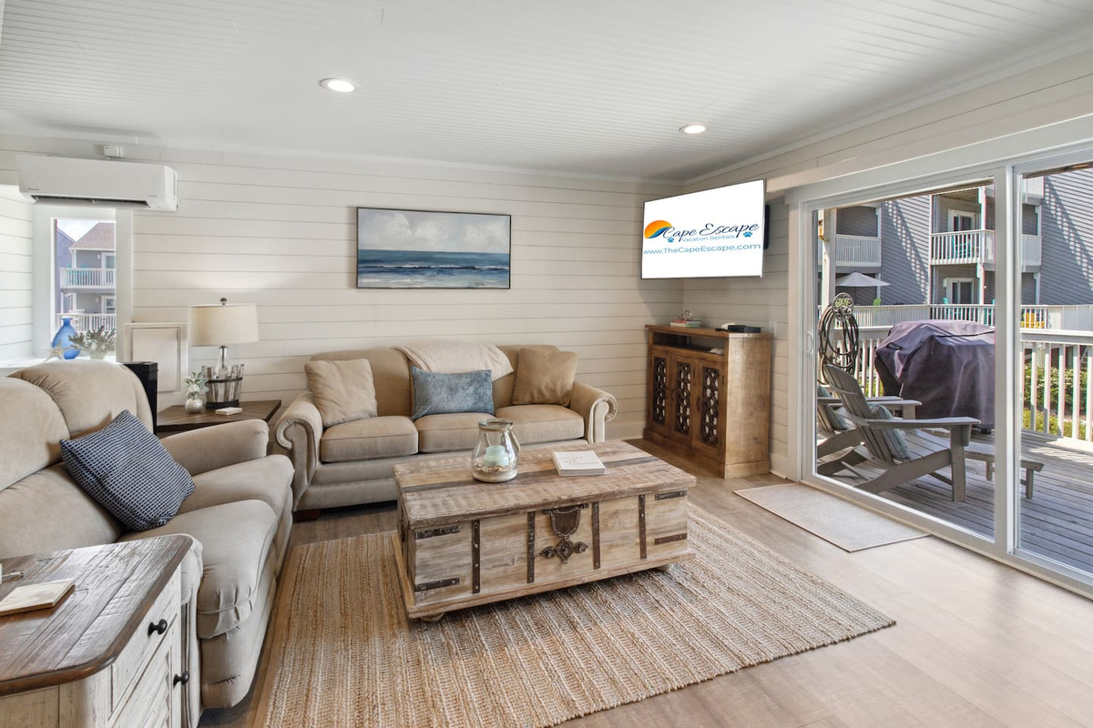 Big Smart TV in the living room, private Gulf-view deck just beyond the door &mdash; game day or beach day, your call.
