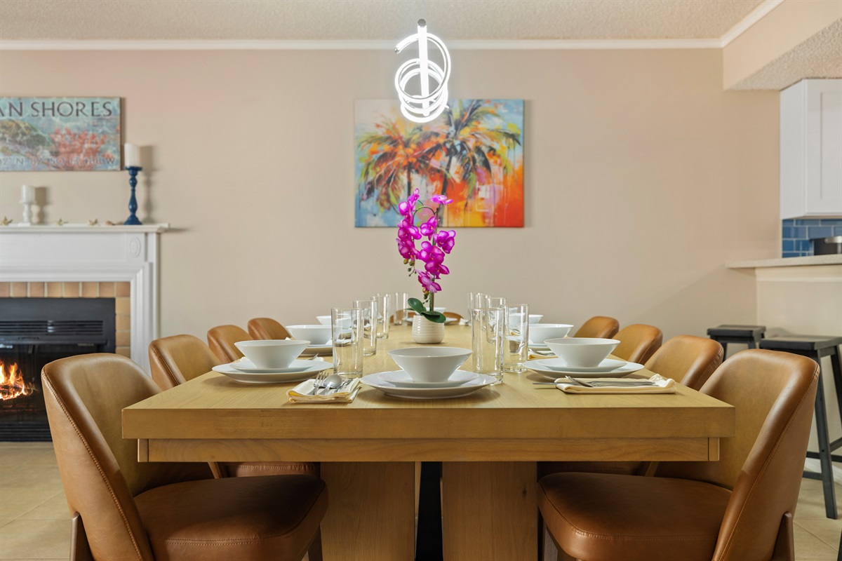 Dining room table seats 10 plus 3 additional bar stools.