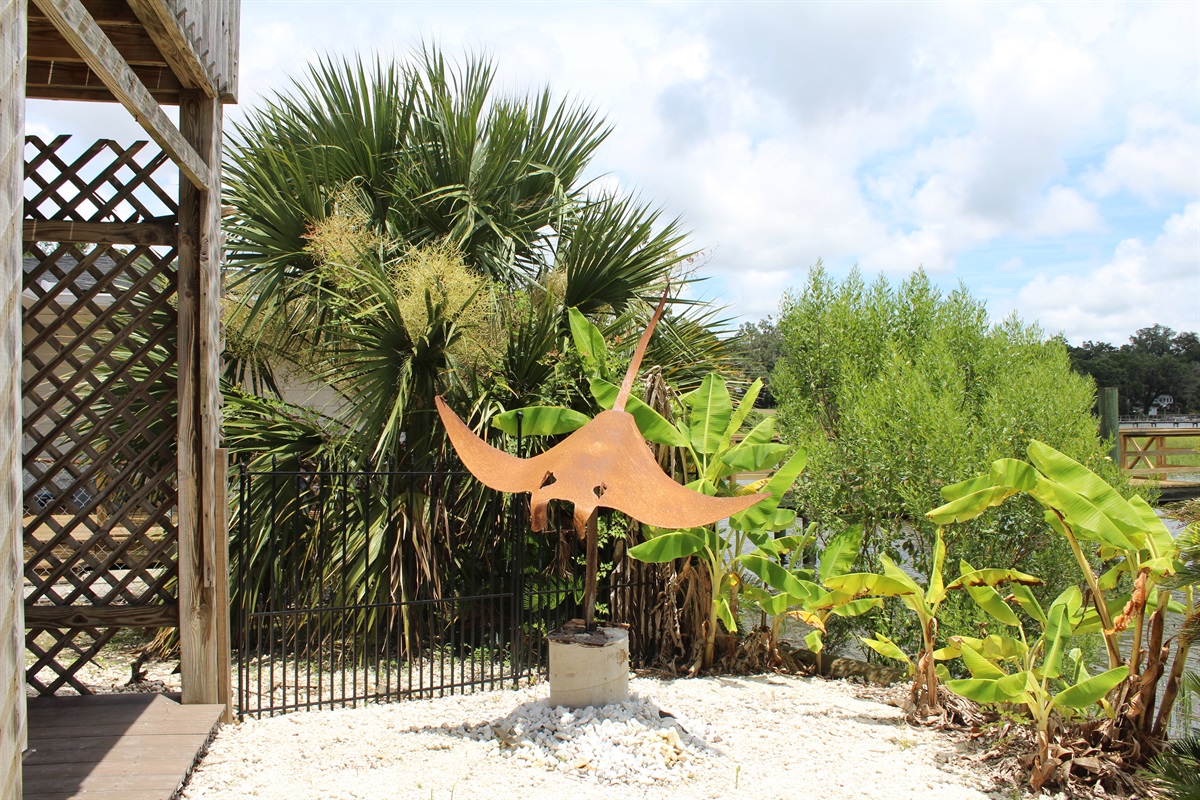 Add a splash of coastal whimsy to your stay with this playful stingray sculpture.