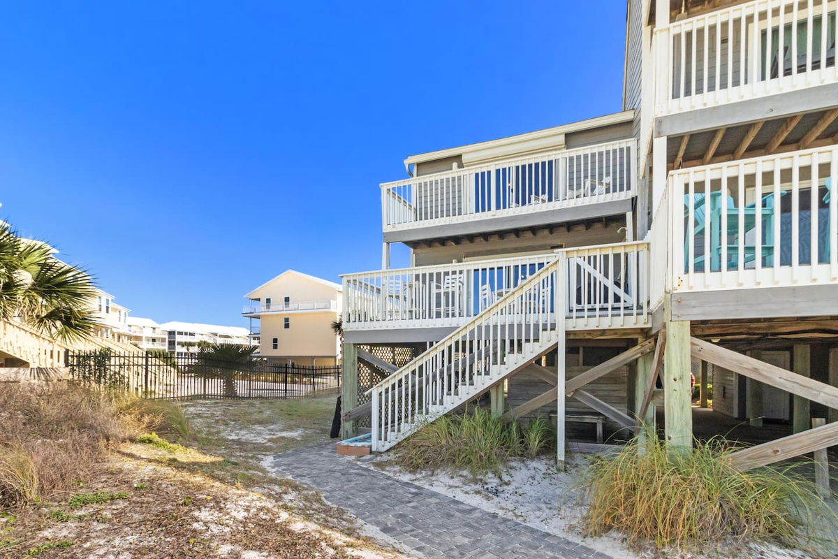 Step out the rear access and you're already in the heart of Barrier Dunes &mdash; the unit lives as open as it feels.