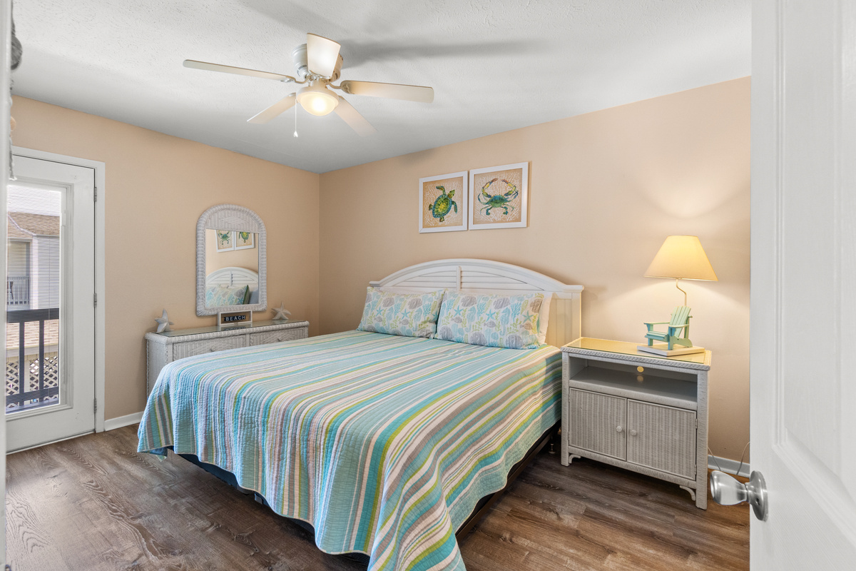 Master Bedroom with King Sized Bed and Balcony