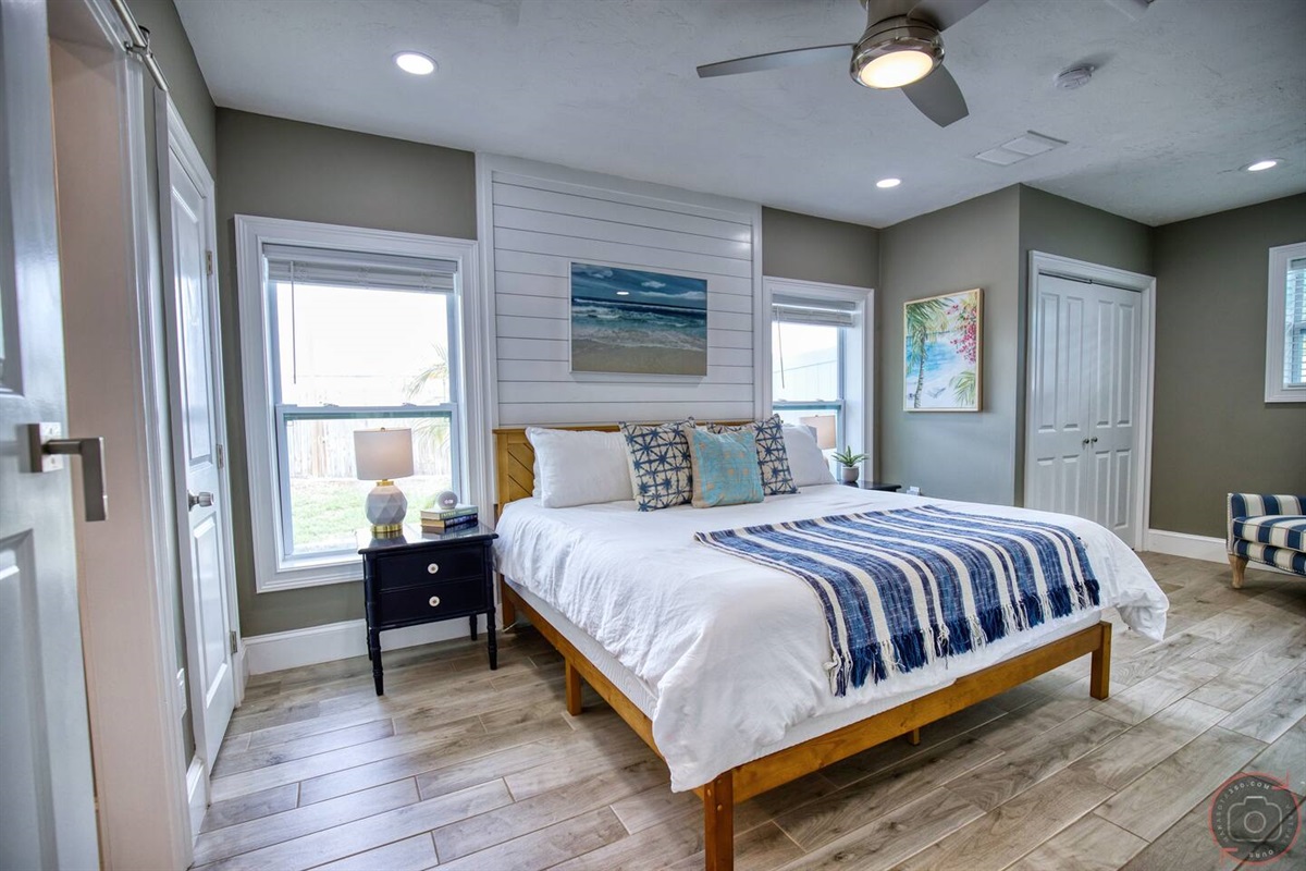 Master Bedroom with an upscale KING bed with nightstands, dresser and a large closet.