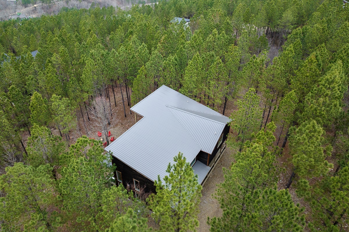 A welcoming cabin exterior surrounded by nature, offering a peaceful and private retreat from the moment you arrive. ✨
