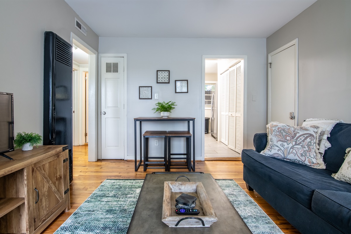 Entryway into the living space, showing easy flow between rooms and homey touches throughout.