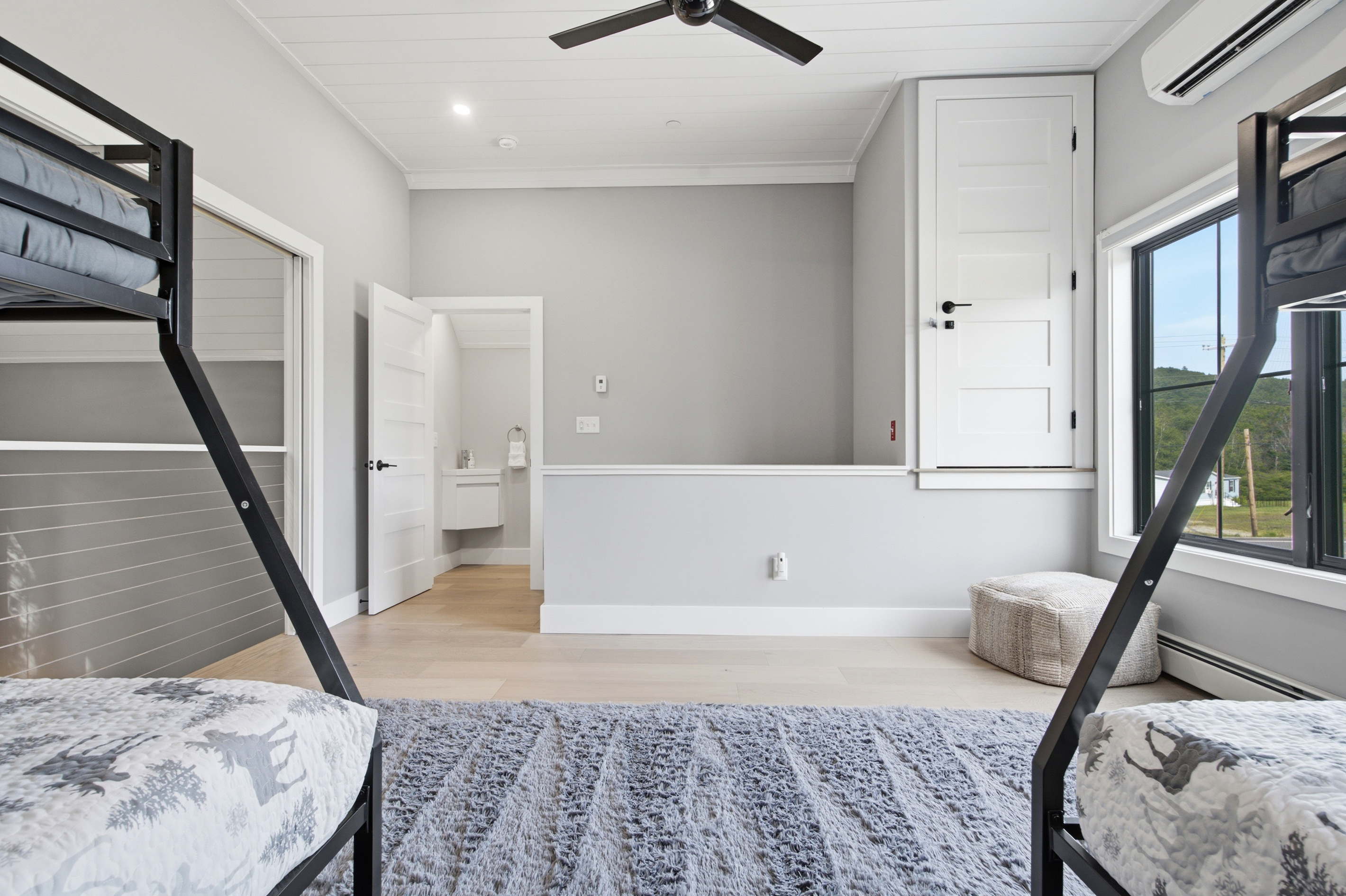 Comfortable bunk beds provide a practical and inviting setup for group stays.